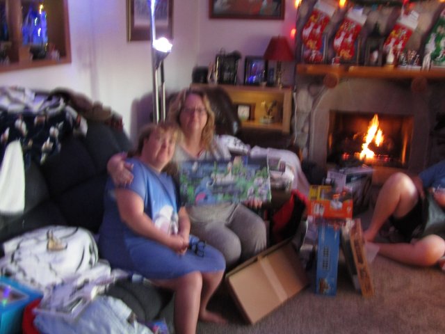 mom and Melissa opening presents